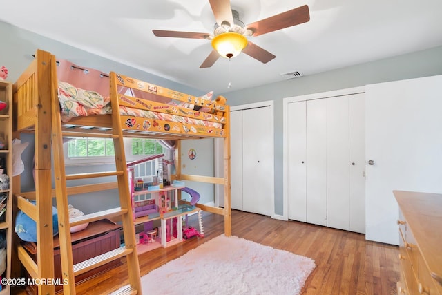 5 Poplar St, Jackson, NJ 08527 - bedroom with two closets, wood finished floors, and a ceiling fan