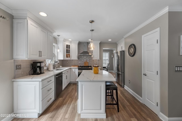 36 Sally St, Howell, NJ 07731 - kitchen featuring wall chimney range hood, stainless steel appliances, white cabinetry, backsplash, and recessed lighting