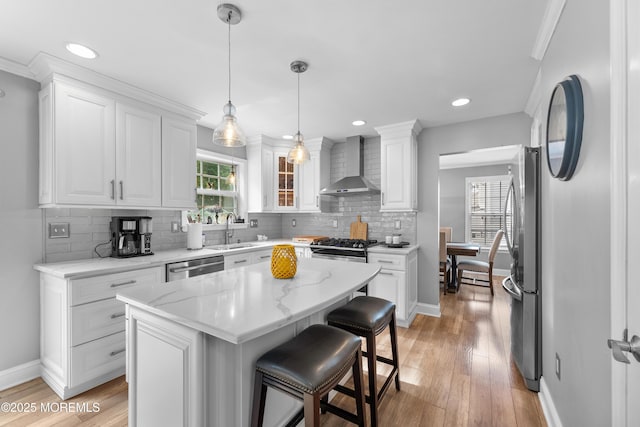 36 Sally St, Howell, NJ 07731 - kitchen featuring wall chimney range hood, white cabinets, stainless steel appliances, decorative backsplash, and recessed lighting