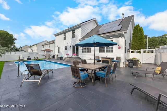 36 Sally St, Howell, NJ 07731 - view of swimming pool featuring a gate, a fenced backyard, a patio, and outdoor dining space