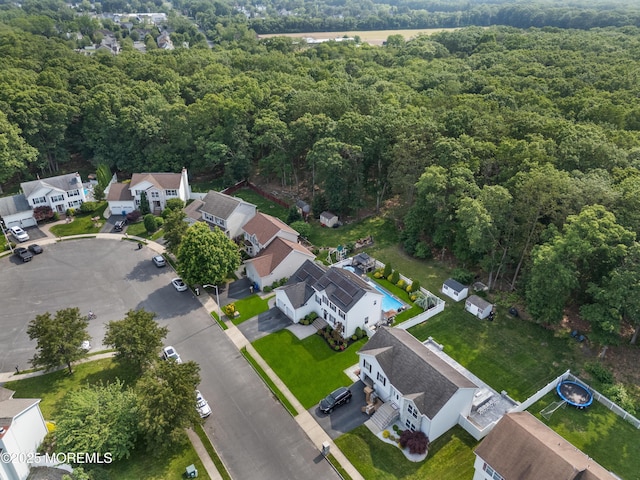 36 Sally St, Howell, NJ 07731 - aerial perspective of suburban area featuring a heavily wooded area