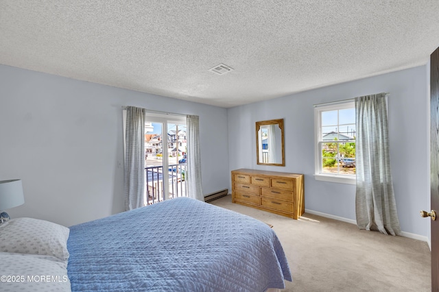 3100 Rte 35 Unit 6, Lavallette, NJ 08735 - bedroom with multiple windows, a baseboard heating unit, light carpet, access to exterior, and a textured ceiling