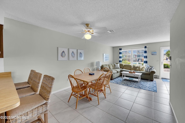 3100 Rte 35 Unit 6, Lavallette, NJ 08735 - tiled dining space with a baseboard radiator, a ceiling fan, and a textured ceiling