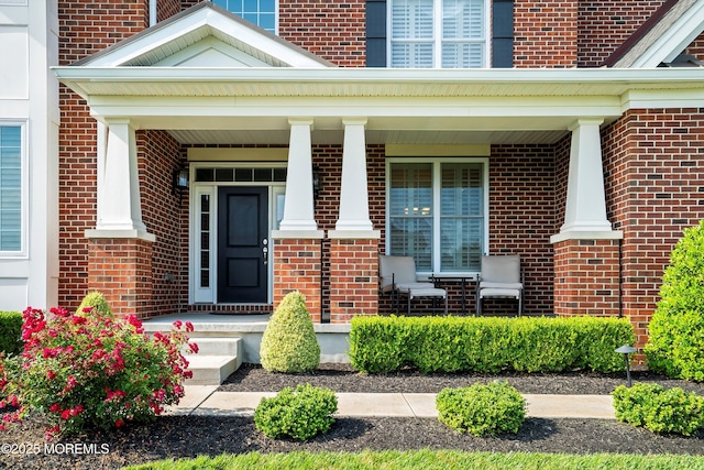 11 Potomac Ct, Freehold, NJ 07728 - entrance to property with brick siding and covered porch
