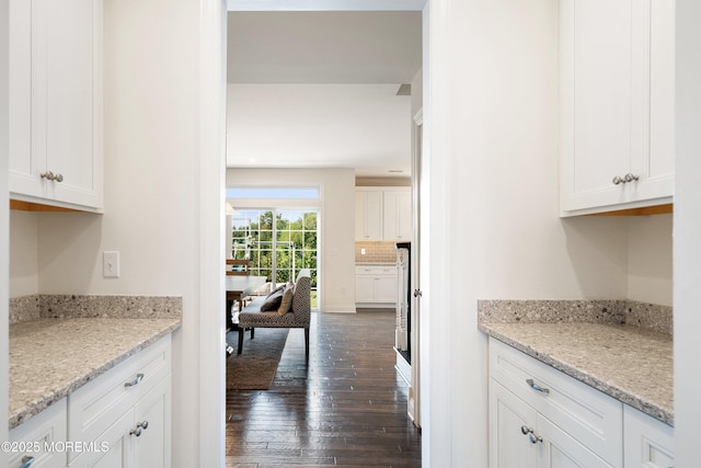 11 Potomac Ct, Freehold, NJ 07728 - kitchen featuring white cabinetry, dark wood-style floors, and light stone countertops