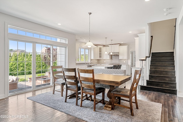 11 Potomac Ct, Freehold, NJ 07728 - dining area with dark wood-type flooring, stairs, and recessed lighting