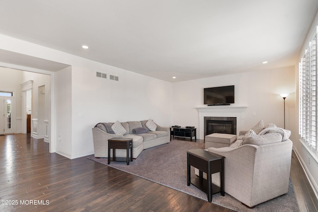 11 Potomac Ct, Freehold, NJ 07728 - living area featuring dark wood finished floors, a fireplace, and recessed lighting