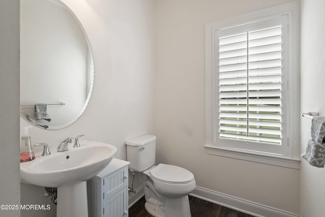11 Potomac Ct, Freehold, NJ 07728 - half bathroom with baseboards and wood finished floors