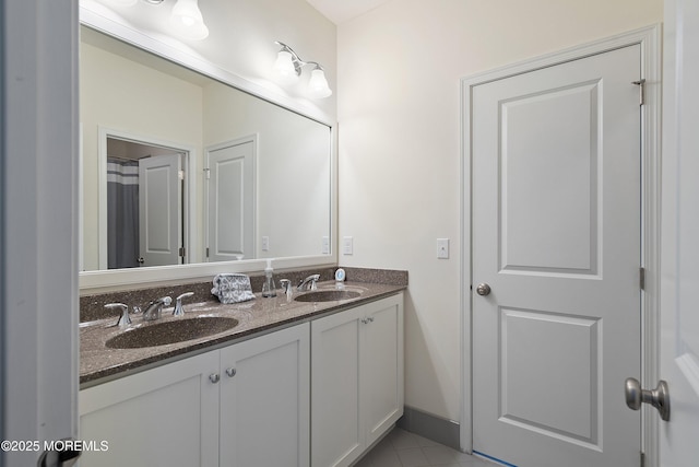 11 Potomac Ct, Freehold, NJ 07728 - bathroom featuring double vanity and tile patterned floors