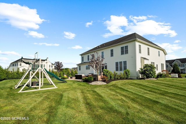 11 Potomac Ct, Freehold, NJ 07728 - view of green lawn featuring a playground