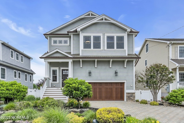 209 Sanborn Ave, Point Pleasant Beach, NJ 08742 - craftsman-style house featuring an attached garage, driveway, and roof with shingles
