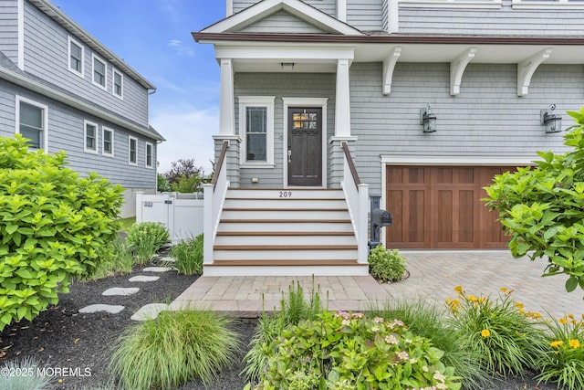 209 Sanborn Ave, Point Pleasant Beach, NJ 08742 - entrance to property with an attached garage and driveway