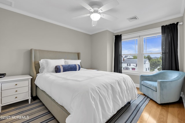 209 Sanborn Ave, Point Pleasant Beach, NJ 08742 - bedroom featuring light wood-style floors, ornamental molding, and a ceiling fan