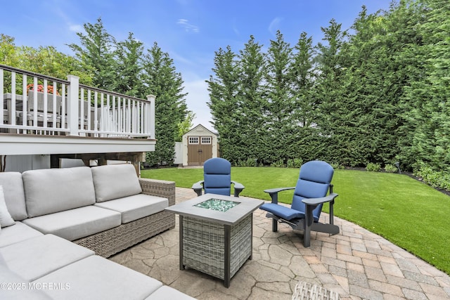209 Sanborn Ave, Point Pleasant Beach, NJ 08742 - view of patio featuring a storage unit and an outdoor living space with a fire pit