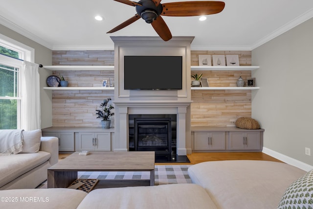 209 Sanborn Ave, Point Pleasant Beach, NJ 08742 - living area with a ceiling fan, crown molding, a glass covered fireplace, recessed lighting, and light wood finished floors