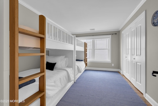 209 Sanborn Ave, Point Pleasant Beach, NJ 08742 - unfurnished bedroom featuring ornamental molding and wood finished floors