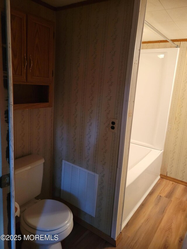 39 Antonia Dr, Jackson, NJ 08527 - full bathroom featuring wood finished floors, wallpapered walls, and a bath