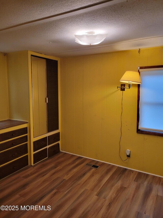 39 Antonia Dr, Jackson, NJ 08527 - unfurnished bedroom featuring wood finished floors and a textured ceiling