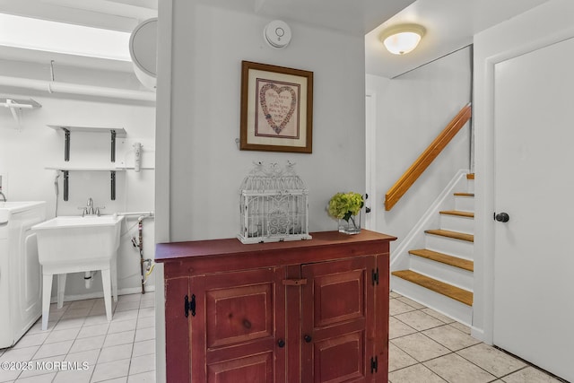 301 Spruce Dr, Brick, NJ 08723 - corridor with light tile patterned floors, washer / clothes dryer, and stairway
