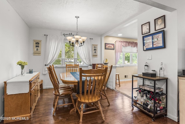 301 Spruce Dr, Brick, NJ 08723 - dining area featuring a chandelier, dark wood finished floors, a textured ceiling, and recessed lighting