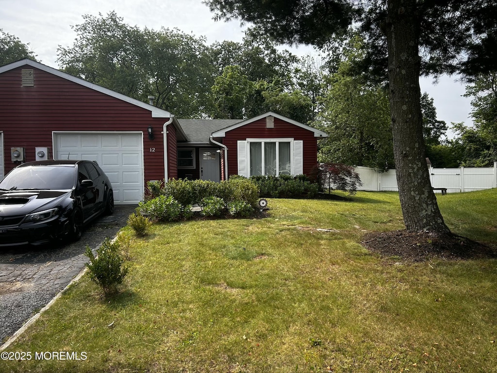12 Briarcliff Ct, Freehold, NJ 07728 - ranch-style house with an attached garage and driveway