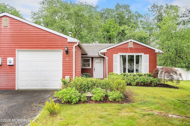 12 Briarcliff Ct, Freehold, NJ 07728 - view of front of house with a front yard, a garage, and driveway
