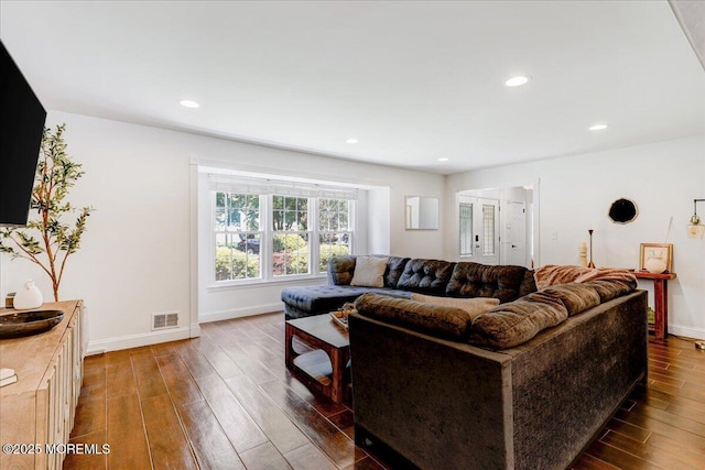 12 Neal Dr, Manalapan, NJ 07726 - living area with dark wood-style floors and recessed lighting