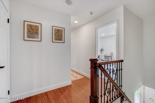 12 Neal Dr, Manalapan, NJ 07726 - hallway with an upstairs landing, light wood-style flooring, and recessed lighting