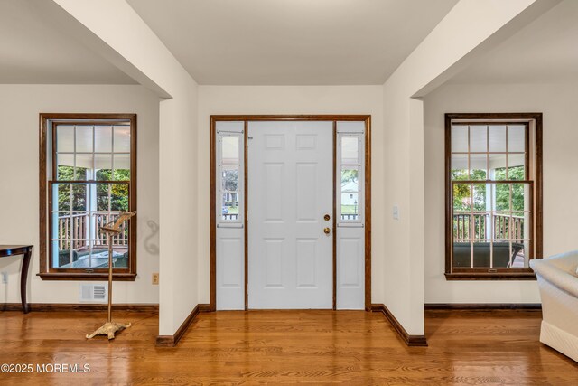 406 Bell Pl, Sea Girt, NJ 08750 - entryway featuring wood finished floors and baseboards
