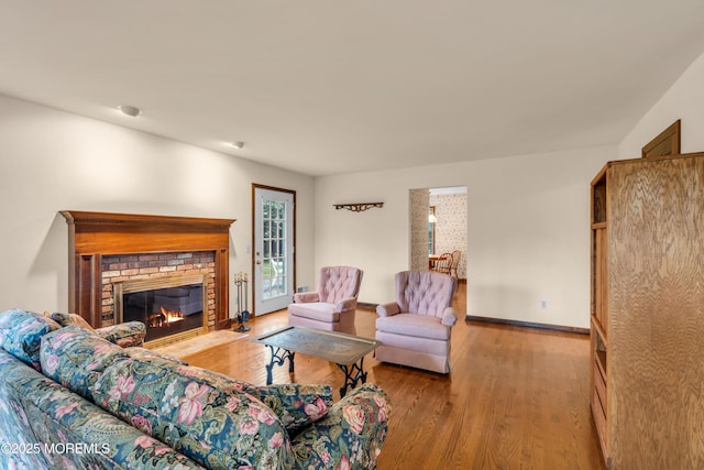 406 Bell Pl, Sea Girt, NJ 08750 - living room with wood finished floors and a brick fireplace