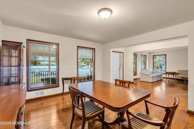 406 Bell Pl, Sea Girt, NJ 08750 - dining room featuring wood finished floors and baseboards