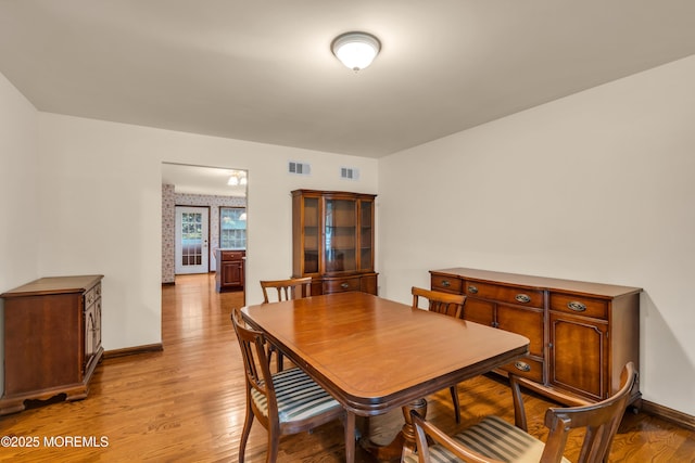 406 Bell Pl, Sea Girt, NJ 08750 - dining area featuring light wood-style flooring and baseboards