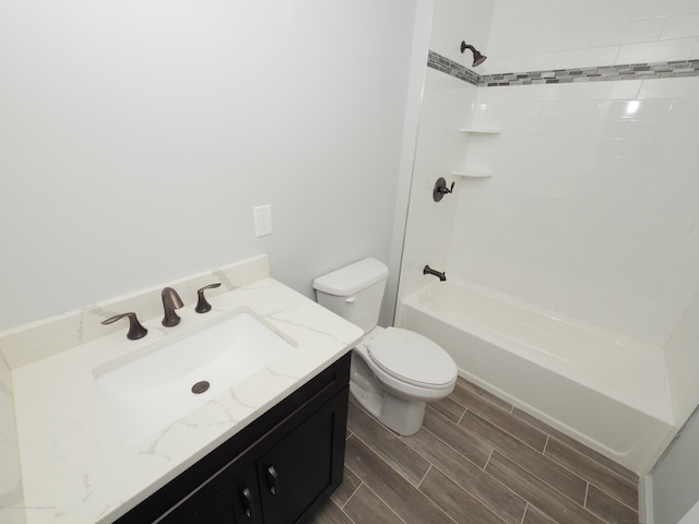 910 Malden Dr, Cliffwood, NJ 07735 - full bath with vanity, wood finish floors, and tub / shower combination