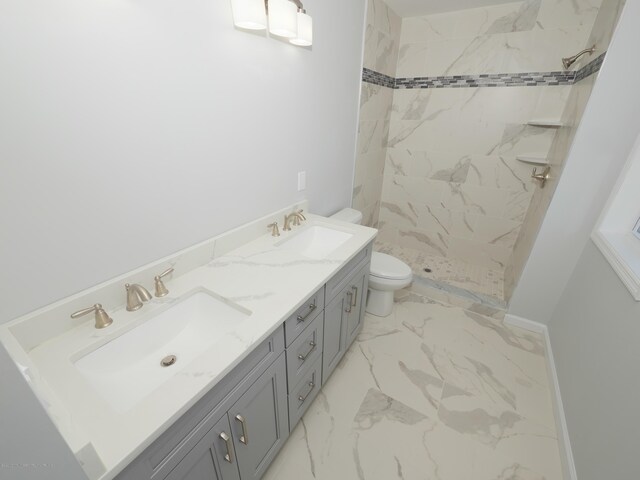 910 Malden Dr, Cliffwood, NJ 07735 - bathroom with marble look tile flooring, a stall shower, and double vanity