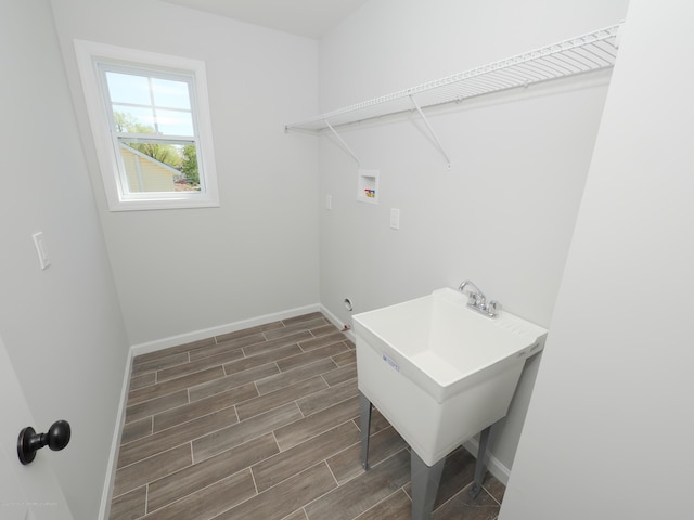 910 Malden Dr, Cliffwood, NJ 07735 - washroom with dark wood finished floors and washer hookup