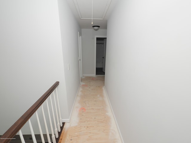 910 Malden Dr, Cliffwood, NJ 07735 - hallway featuring attic access, light wood-style flooring, and an upstairs landing