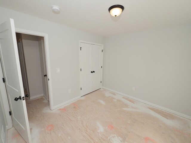 910 Malden Dr, Cliffwood, NJ 07735 - unfurnished bedroom with a closet and baseboards