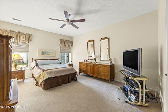 17 Evergreen Springs Dr, Lakewood, NJ 08701 - bedroom featuring multiple windows, carpet, a textured ceiling, and ceiling fan