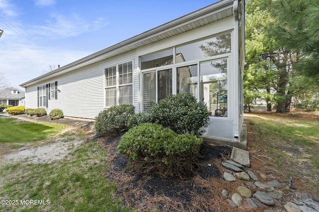 17 Evergreen Springs Dr, Lakewood, NJ 08701 - view of side of home featuring a sunroom