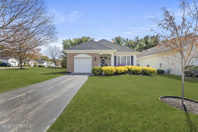 17 Evergreen Springs Dr, Lakewood, NJ 08701 - ranch-style house featuring a front yard, an attached garage, asphalt driveway, brick siding, and a shingled roof