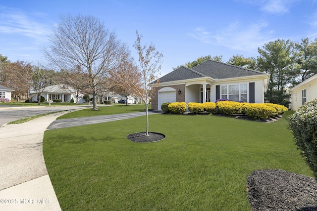17 Evergreen Springs Dr, Lakewood, NJ 08701 - view of front of property with a front lawn, concrete driveway, a garage, a shingled roof, and a residential view
