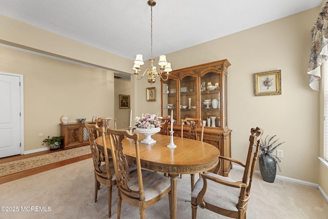 17 Evergreen Springs Dr, Lakewood, NJ 08701 - dining room with a chandelier and baseboards