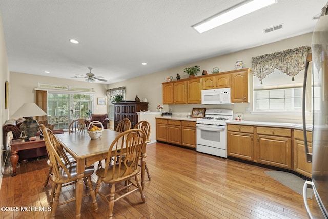 17 Evergreen Springs Dr, Lakewood, NJ 08701 - kitchen with white appliances, plenty of natural light, light countertops, light wood-style floors, and recessed lighting