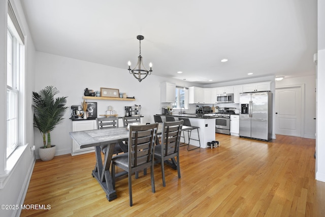 623 Park Ave, Port Monmouth, NJ 07758 - dining space with a chandelier, light wood-style floors, and recessed lighting