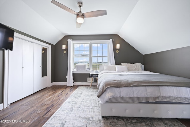 623 Park Ave, Port Monmouth, NJ 07758 - bedroom with wood finished floors, vaulted ceiling, and ceiling fan