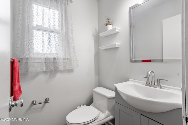 8 Mendon Dr, Howell, NJ 07731 - half bath featuring vanity and toilet