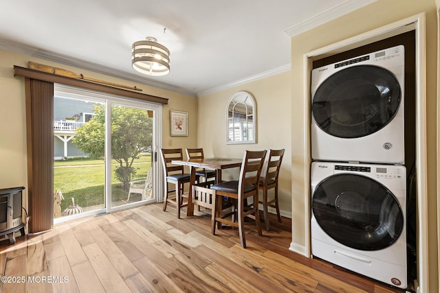 100 Seaview Ave Unit 6-5, Monmouth Beach, NJ 07750 - laundry area with estacked washer and dryer, crown molding, and wood finished floors