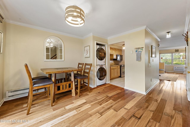 100 Seaview Ave Unit 6-5, Monmouth Beach, NJ 07750 - dining area with stacked washer / dryer, light wood-type flooring, a wall mounted air conditioner, crown molding, and a baseboard heating unit