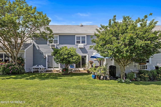 100 Seaview Ave Unit 6-5, Monmouth Beach, NJ 07750 - rear view of property with a yard and roof with shingles