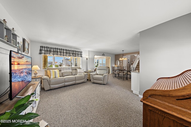 118 S Binnacle Dr, Little Egg Harbor, NJ 08087 - carpeted living room with a chandelier and healthy amount of natural light